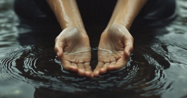 Hands in water