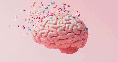 Representation of a brain with confetti around it