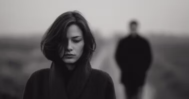 Woman walking away looking sad