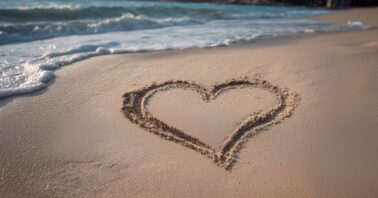 Love heart drawn in the sand