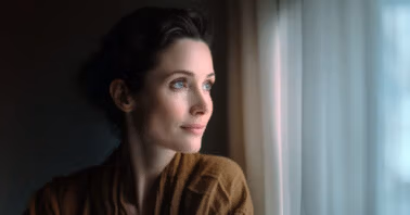 Woman looking outside