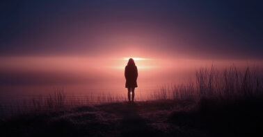 Silhouette of a person at sunrise