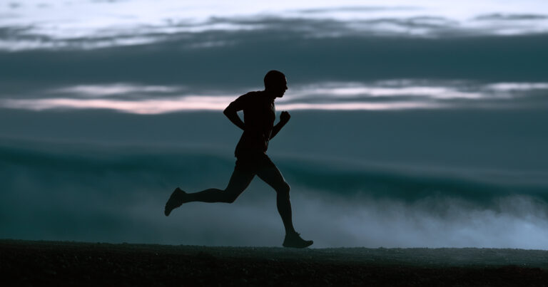 Silhouette of a man running